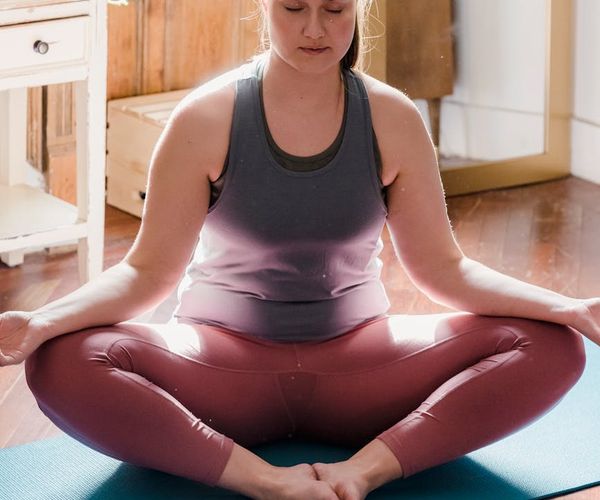Detailed view of a person focusing during yoga session